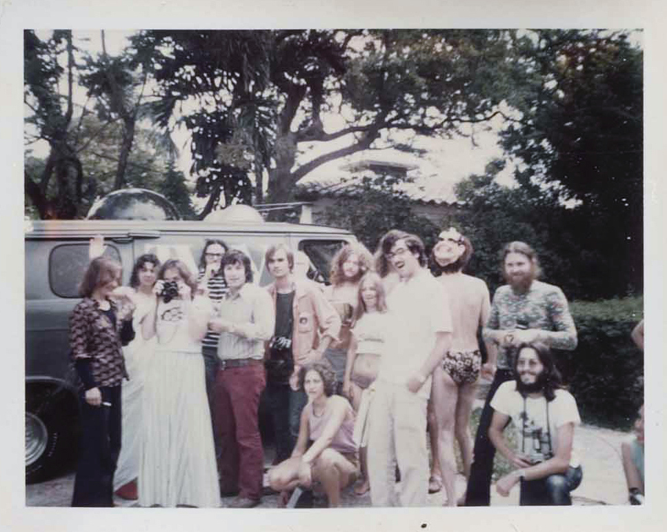 tvtv crew poses for a group photo in front of the tvtv media van