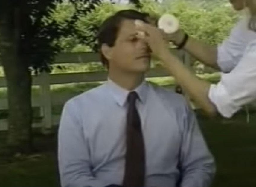 Al Gore getting makeup applied during 1992 presidential campaign