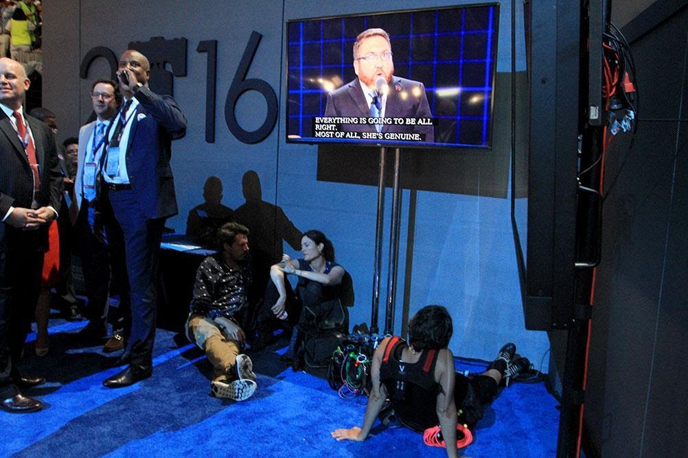 news crews waiting and watching a screen during the 2016 Democratic National Convention