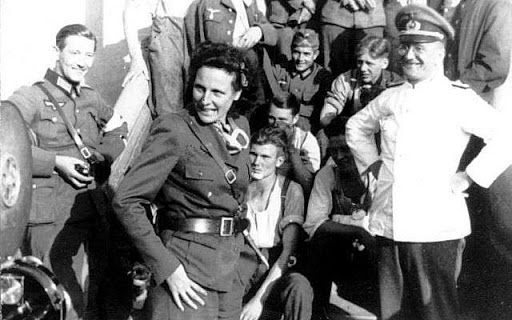 Leni Riefenstahl among other Nazis in uniform